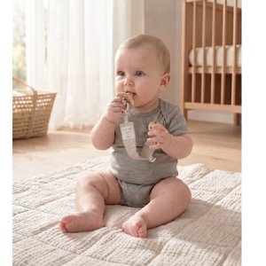 Attache-tétine universelle en coton bio beige Noukies