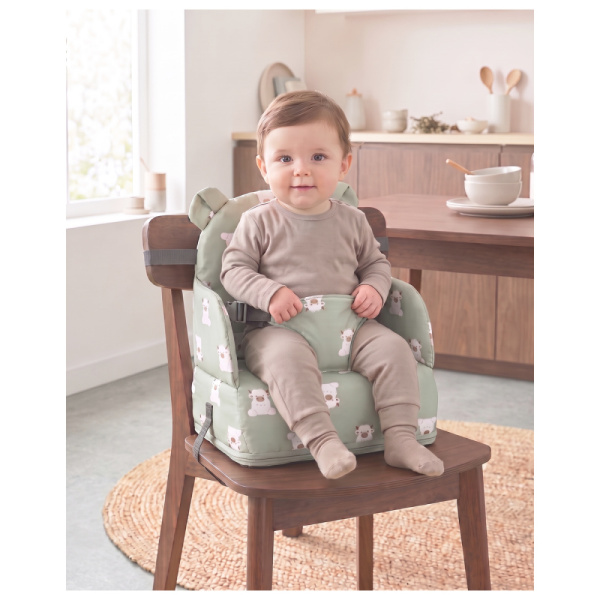 Rehausseur de chaise bébé pliable et imperméable fluffy Noukies