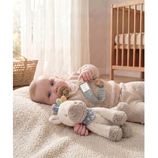 Attache-tétine universelle en coton bio bleu Noukies
