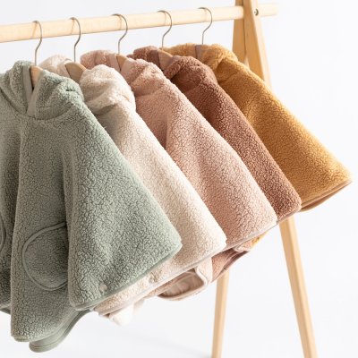 Poncho chaud de voyage teddy bouclette ficelle