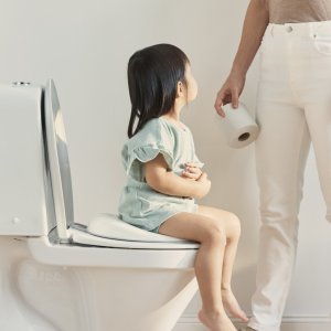 Réducteur de toilette blanc et gris Babybjorn