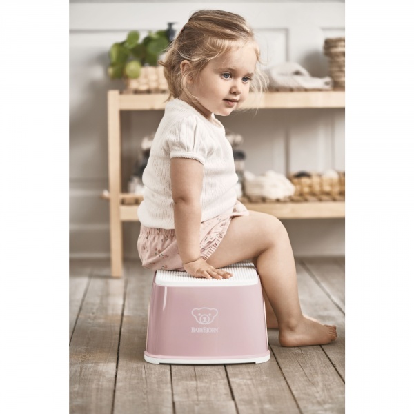 Marche pied enfant rose pastel et blanc Babybjorn