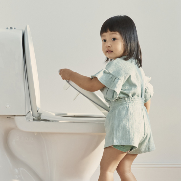 Réducteur de toilette blanc et gris Babybjorn