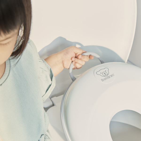 Réducteur de toilette blanc et gris Babybjorn