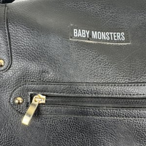 Les imparfaits - sac à langer végan noir Baby monsters