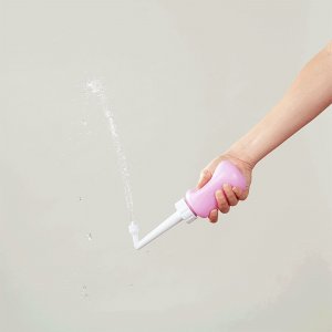 Bouteille de lavage périnéale renversée momwasher Frida