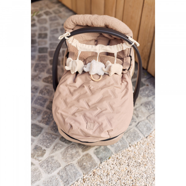 Nid d’ange groupe 0+ passe-sangle bébé embossed sand Jollein