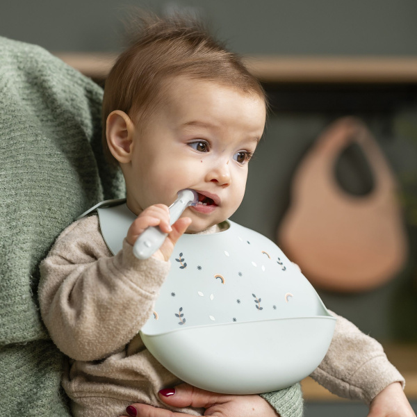 Bavoir en silicone vert avec imprimé Nattou