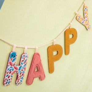 Lettre en tissu phosphorescente rose a Lilliputiens