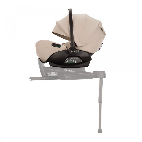 Poussette trio triv lx + siège auto arra flex + nacelle lytl biscotti Nuna