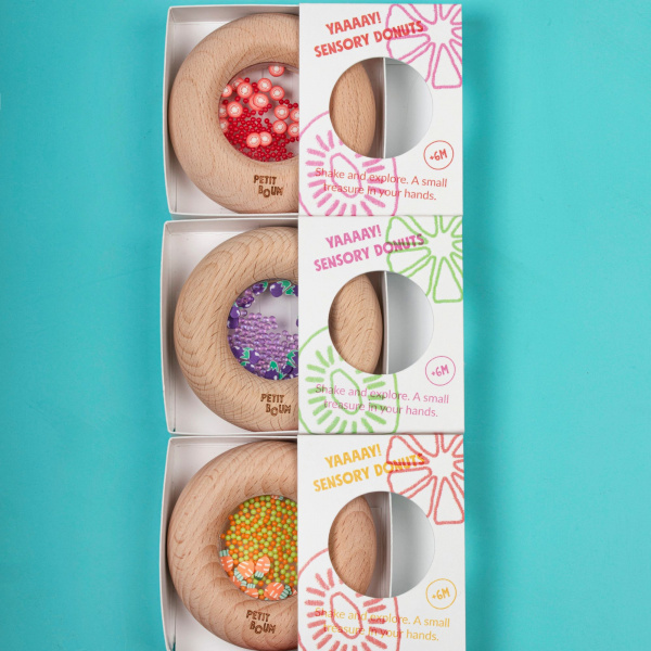 Hochet sensoriel bébé donut en bois tomates Petit boum