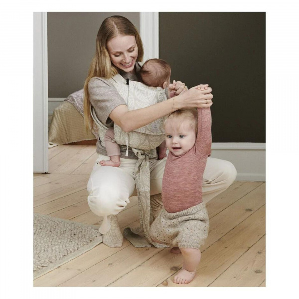 Porte bébé limas carrier léopard violet Stokke