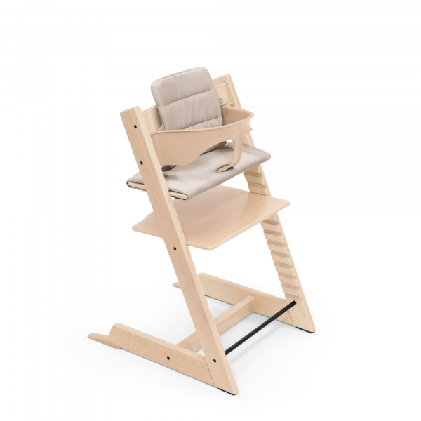 Pack chaise haute tripp trapp avec son baby set et son coussin naturel Stokke