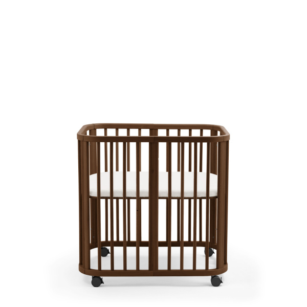 Berceau en bois mini nighti warm brown + matelas Stokke