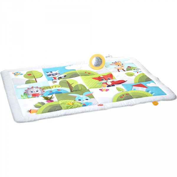 Tapis d'éveil géant dans la prairie