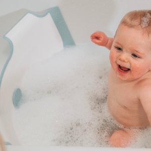 Réducteur de baignoire blanc et rose Babydam